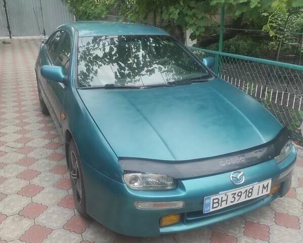 Зеленый Мазда 323, объемом двигателя 1.5 л и пробегом 323 тыс. км за 2200 $, фото 7 на Automoto.ua