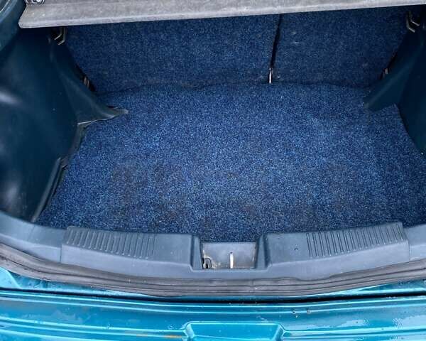 Зеленый Мазда 323, объемом двигателя 1.49 л и пробегом 322 тыс. км за 2600 $, фото 14 на Automoto.ua