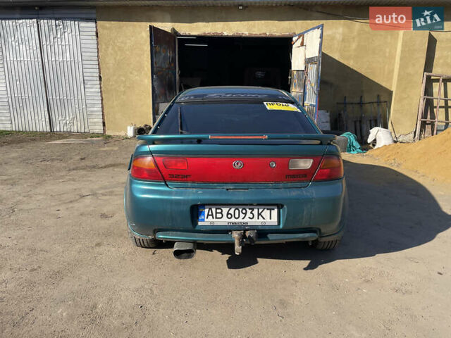 Зелений Мазда 323, об'ємом двигуна 2 л та пробігом 265 тис. км за 1550 $, фото 4 на Automoto.ua