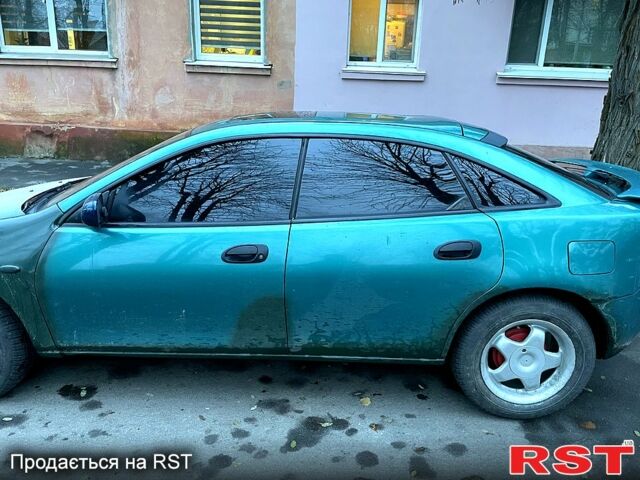 Зеленый Мазда 323, объемом двигателя 1.5 л и пробегом 334 тыс. км за 1800 $, фото 2 на Automoto.ua