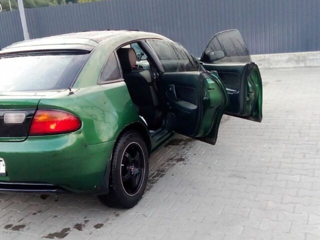 Зеленый Мазда 323, объемом двигателя 0 л и пробегом 333 тыс. км за 1800 $, фото 2 на Automoto.ua