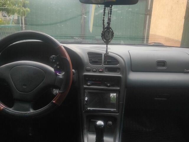 Зеленый Мазда 323, объемом двигателя 0 л и пробегом 323 тыс. км за 2200 $, фото 6 на Automoto.ua