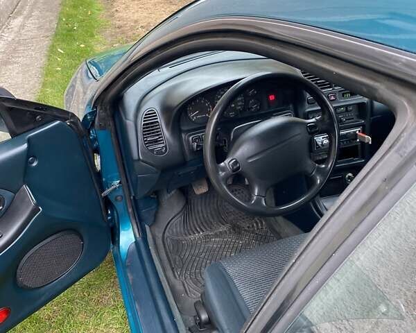 Зеленый Мазда 323, объемом двигателя 1.49 л и пробегом 322 тыс. км за 2600 $, фото 6 на Automoto.ua