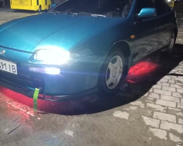 Зеленый Мазда 323, объемом двигателя 1.5 л и пробегом 350 тыс. км за 2750 $, фото 2 на Automoto.ua