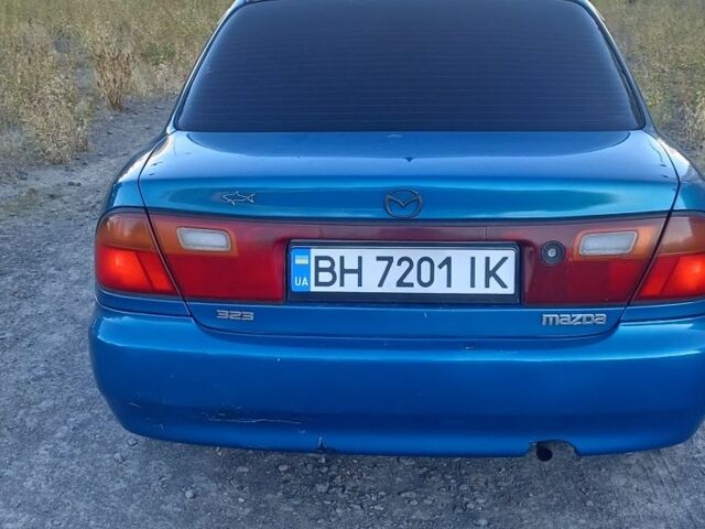 Зеленый Мазда 323, объемом двигателя 1.5 л и пробегом 300 тыс. км за 1903 $, фото 2 на Automoto.ua