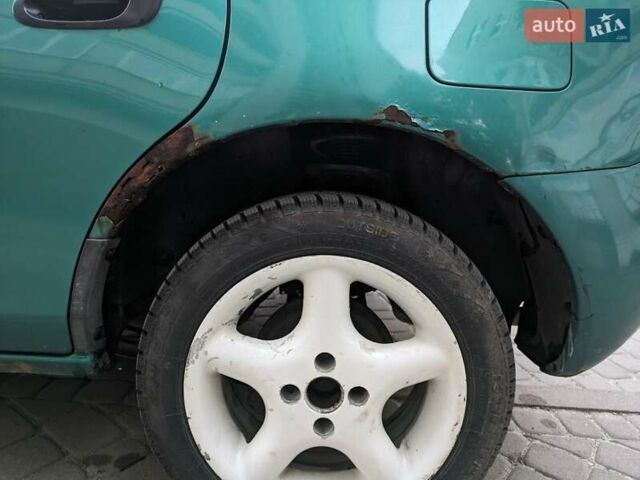Зеленый Мазда 323, объемом двигателя 1.49 л и пробегом 290 тыс. км за 1799 $, фото 9 на Automoto.ua