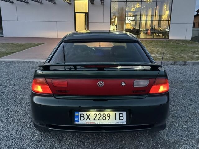 Зеленый Мазда 323, объемом двигателя 1.5 л и пробегом 451 тыс. км за 2600 $, фото 3 на Automoto.ua