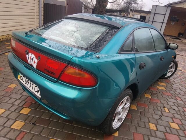 Зеленый Мазда 323, объемом двигателя 1.5 л и пробегом 270 тыс. км за 1999 $, фото 5 на Automoto.ua