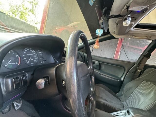 Зеленый Мазда 323, объемом двигателя 1.5 л и пробегом 451 тыс. км за 2600 $, фото 13 на Automoto.ua