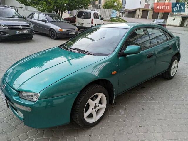 Зеленый Мазда 323, объемом двигателя 1.49 л и пробегом 290 тыс. км за 1799 $, фото 1 на Automoto.ua