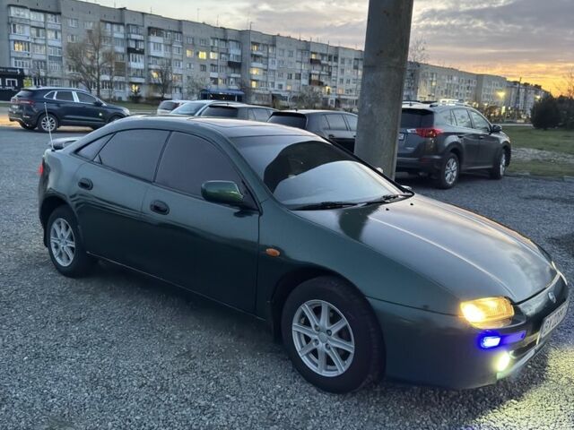 Зеленый Мазда 323, объемом двигателя 1.5 л и пробегом 451 тыс. км за 2600 $, фото 6 на Automoto.ua