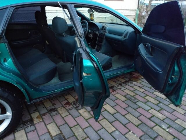 Зеленый Мазда 323, объемом двигателя 1.5 л и пробегом 100 тыс. км за 1350 $, фото 5 на Automoto.ua
