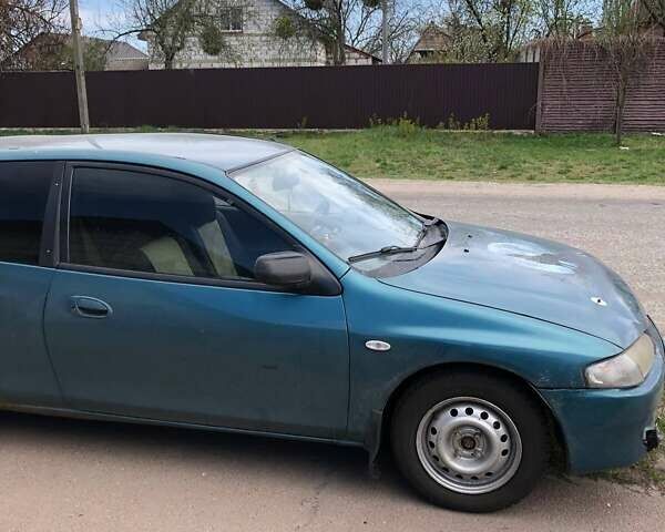 Зеленый Мазда 323, объемом двигателя 1.5 л и пробегом 290 тыс. км за 1500 $, фото 20 на Automoto.ua