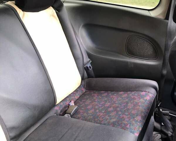 Зеленый Мазда 323, объемом двигателя 1.5 л и пробегом 290 тыс. км за 1500 $, фото 7 на Automoto.ua