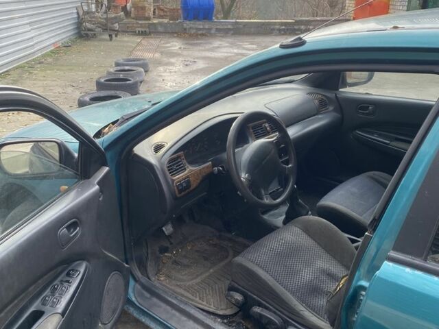 Зеленый Мазда 323, объемом двигателя 1.5 л и пробегом 424 тыс. км за 1500 $, фото 4 на Automoto.ua