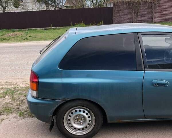 Зеленый Мазда 323, объемом двигателя 1.5 л и пробегом 290 тыс. км за 1500 $, фото 26 на Automoto.ua