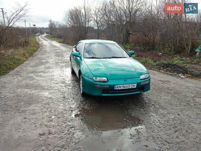 Зелений Мазда 323, об'ємом двигуна 1.49 л та пробігом 350 тис. км за 2100 $, фото 6 на Automoto.ua
