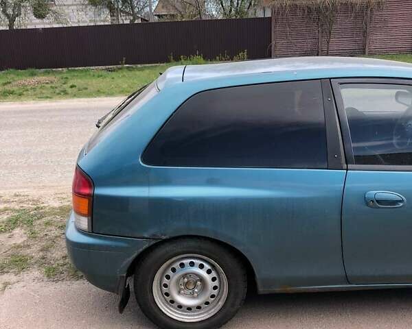 Зеленый Мазда 323, объемом двигателя 1.5 л и пробегом 290 тыс. км за 1500 $, фото 22 на Automoto.ua