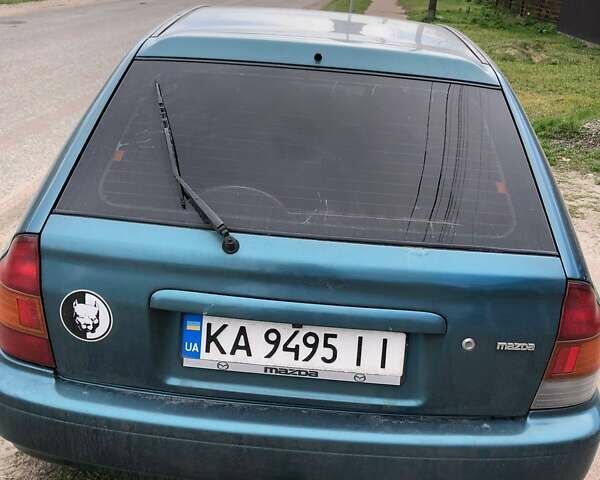 Зеленый Мазда 323, объемом двигателя 1.5 л и пробегом 290 тыс. км за 1500 $, фото 17 на Automoto.ua