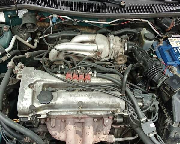 Зелений Мазда 323, об'ємом двигуна 1.49 л та пробігом 350 тис. км за 2100 $, фото 10 на Automoto.ua