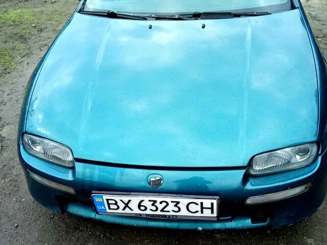 Зеленый Мазда 323, объемом двигателя 1.5 л и пробегом 161 тыс. км за 2100 $, фото 2 на Automoto.ua
