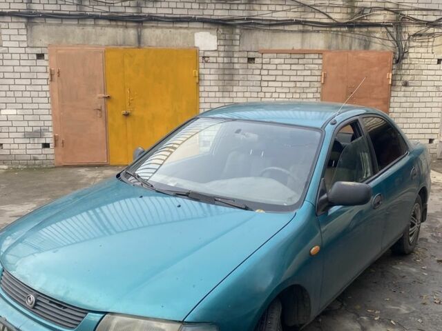 Зеленый Мазда 323, объемом двигателя 1.5 л и пробегом 424 тыс. км за 1500 $, фото 5 на Automoto.ua