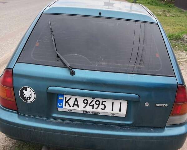 Зеленый Мазда 323, объемом двигателя 1.5 л и пробегом 290 тыс. км за 1500 $, фото 11 на Automoto.ua