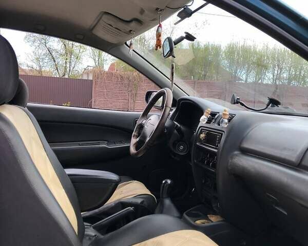 Зеленый Мазда 323, объемом двигателя 1.5 л и пробегом 290 тыс. км за 1500 $, фото 6 на Automoto.ua