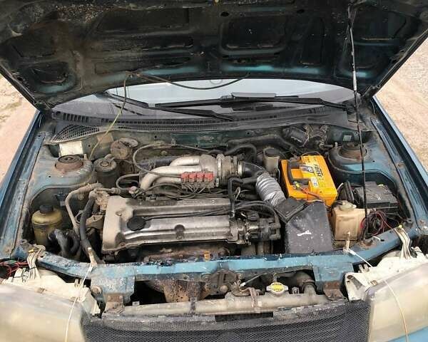 Зеленый Мазда 323, объемом двигателя 1.5 л и пробегом 290 тыс. км за 1500 $, фото 13 на Automoto.ua