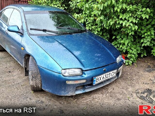 Зеленый Мазда 323, объемом двигателя 1.5 л и пробегом 161 тыс. км за 2100 $, фото 5 на Automoto.ua