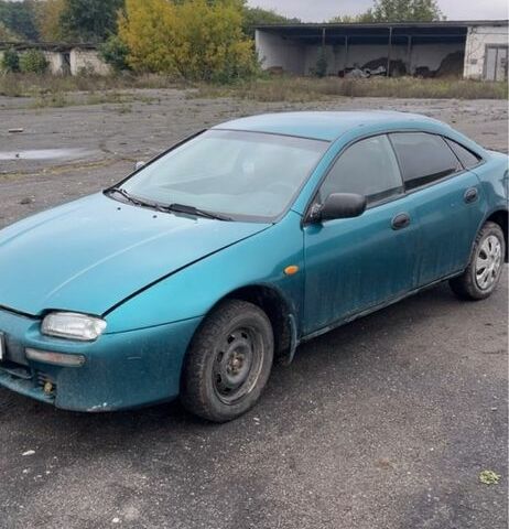Зелений Мазда 323, об'ємом двигуна 0 л та пробігом 300 тис. км за 1300 $, фото 2 на Automoto.ua