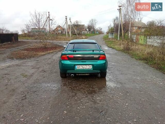 Зелений Мазда 323, об'ємом двигуна 1.49 л та пробігом 350 тис. км за 2100 $, фото 8 на Automoto.ua