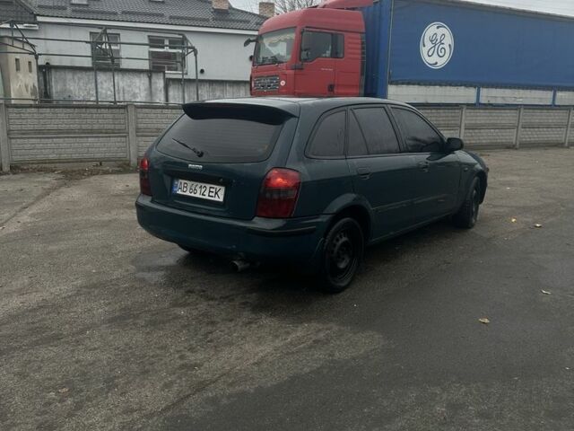 Зеленый Мазда 323, объемом двигателя 1.5 л и пробегом 400 тыс. км за 1500 $, фото 2 на Automoto.ua