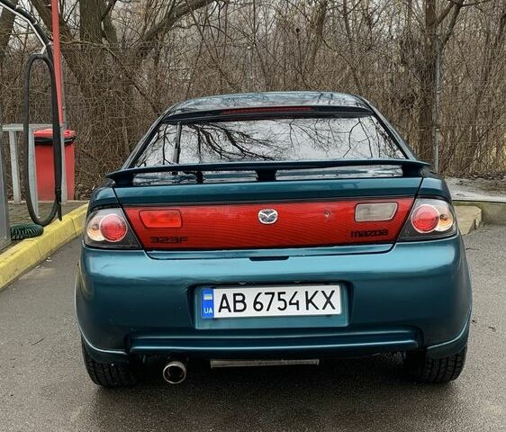 Зелений Мазда 323, об'ємом двигуна 1.5 л та пробігом 270 тис. км за 2000 $, фото 1 на Automoto.ua
