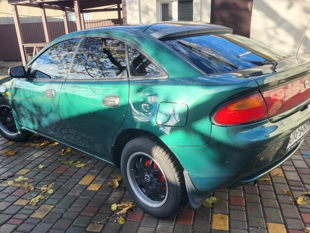 Зеленый Мазда 323, объемом двигателя 1.5 л и пробегом 270 тыс. км за 2199 $, фото 3 на Automoto.ua