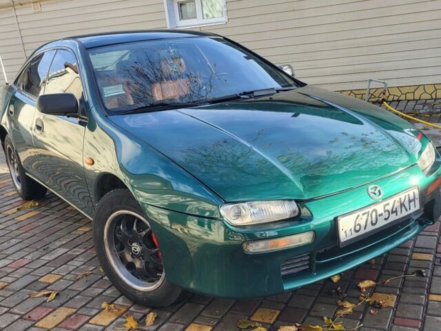 Зеленый Мазда 323, объемом двигателя 1.5 л и пробегом 270 тыс. км за 2199 $, фото 1 на Automoto.ua
