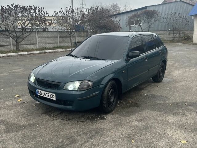 Зеленый Мазда 323, объемом двигателя 1.5 л и пробегом 400 тыс. км за 1500 $, фото 1 на Automoto.ua