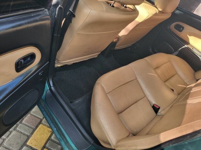 Зеленый Мазда 323, объемом двигателя 1.5 л и пробегом 270 тыс. км за 2199 $, фото 7 на Automoto.ua