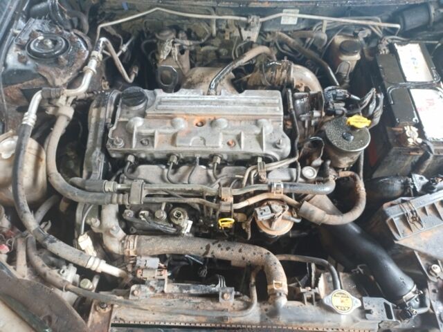 Зеленый Мазда 323, объемом двигателя 2 л и пробегом 415 тыс. км за 560 $, фото 11 на Automoto.ua