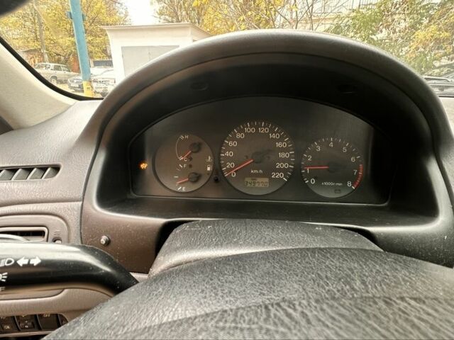 Мазда 323 1999 в Киеве на Automoto.ua Зеленый Мазда 323, объемом двигателя 1.5 л и пробегом 350 тыс. км за 2400 $, фото 15 на Automoto.ua