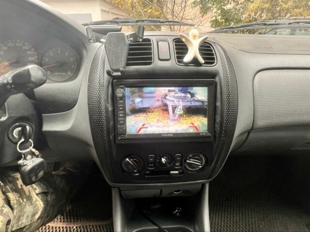 Мазда 323 1999 в Киеве на Automoto.ua Зеленый Мазда 323, объемом двигателя 1.5 л и пробегом 350 тыс. км за 2400 $, фото 16 на Automoto.ua