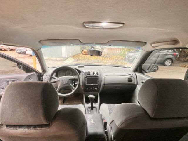 Мазда 323 1999 в Киеве на Automoto.ua Зеленый Мазда 323, объемом двигателя 1.5 л и пробегом 350 тыс. км за 2400 $, фото 13 на Automoto.ua