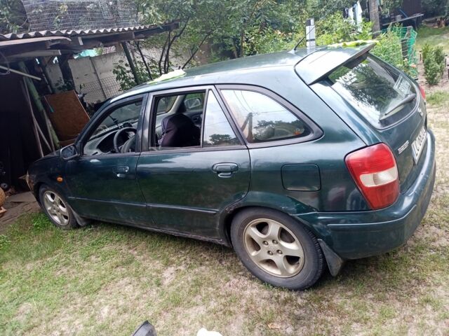 Зеленый Мазда 323, объемом двигателя 2 л и пробегом 415 тыс. км за 560 $, фото 3 на Automoto.ua