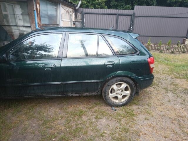 Зеленый Мазда 323, объемом двигателя 2 л и пробегом 415 тыс. км за 560 $, фото 10 на Automoto.ua