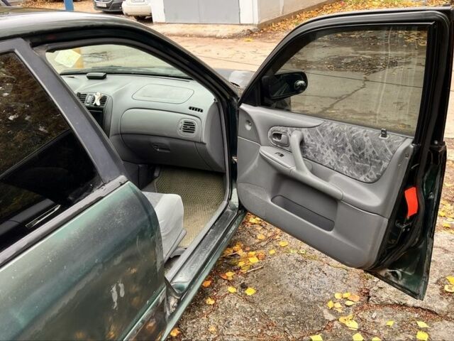 Мазда 323 1999 в Киеве на Automoto.ua Зеленый Мазда 323, объемом двигателя 1.5 л и пробегом 350 тыс. км за 2400 $, фото 8 на Automoto.ua