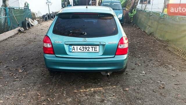 Зеленый Мазда 323, объемом двигателя 1.6 л и пробегом 288 тыс. км за 2000 $, фото 7 на Automoto.ua