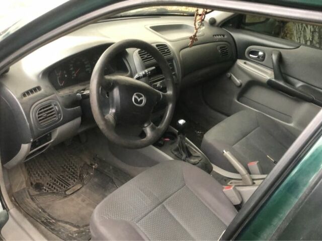 Зелений Мазда 323, об'ємом двигуна 1.6 л та пробігом 327 тис. км за 2900 $, фото 1 на Automoto.ua