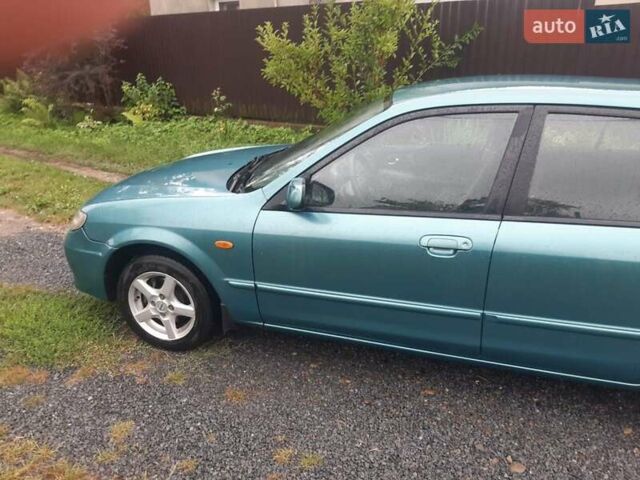 Зеленый Мазда 323, объемом двигателя 1.6 л и пробегом 199 тыс. км за 2500 $, фото 4 на Automoto.ua