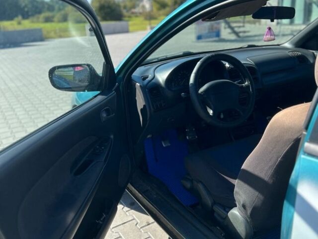 Зеленый Мазда 323, объемом двигателя 1.5 л и пробегом 317 тыс. км за 1300 $, фото 10 на Automoto.ua