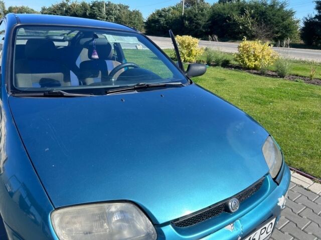 Зеленый Мазда 323, объемом двигателя 1.5 л и пробегом 317 тыс. км за 1300 $, фото 12 на Automoto.ua